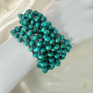 Green beaded multi strand bracelet